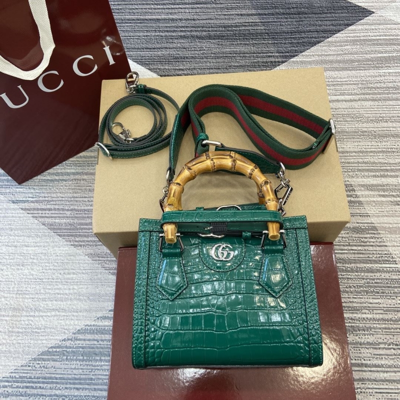 G*u*i top handle bags